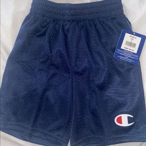 Kids Champion navy blue shorts.